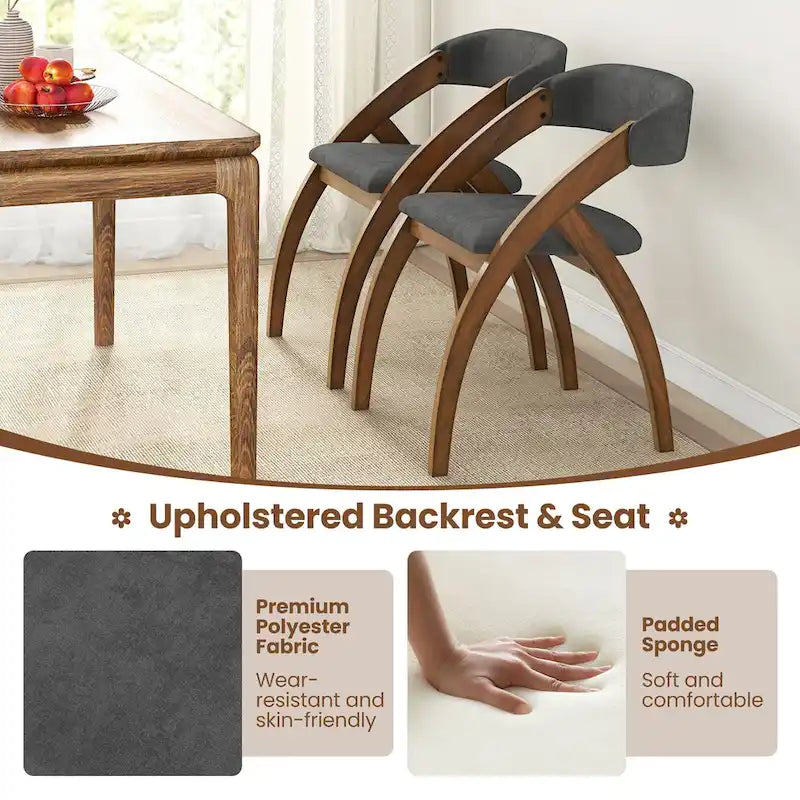 Ensemble de 4 chaises de salle à manger Gymax avec coussin rembourré et dossier incurvé.