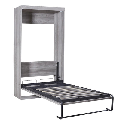 Le lit escamotable en bois peut être replié dans un meuble.